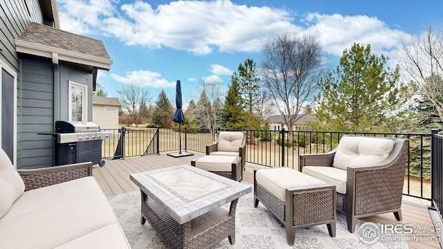 wooden deck featuring grilling area and outdoor lounge area