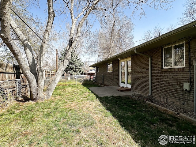 view of yard with a patio area and fence private yard