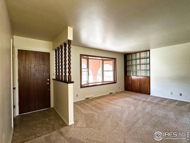 1401 Constitution Ave, Fort Collins, CO 80521 - foyer entrance with visible vents, baseboards, and carpet flooring