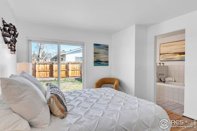 spare room with a baseboard radiator, baseboards, and carpet floors