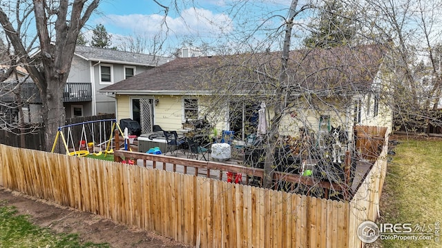 2706 Balmoral Ct, Fort Collins, CO 80525 - exterior space with a chimney, fence private yard, and roof with shingles