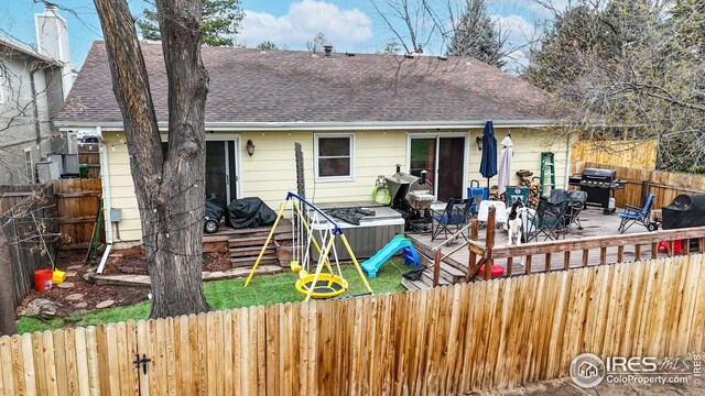 2706 Balmoral Ct, Fort Collins, CO 80525 - rear view of property featuring a fenced backyard, a deck, and a shingled roof