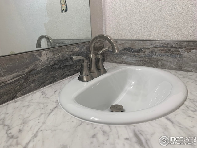 198 Poudre River Rd, Bellvue, CO 80512 - room details featuring a sink and a textured wall