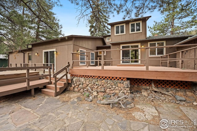 198 Poudre River Rd, Bellvue, CO 80512 - rear view of property featuring a wooden deck