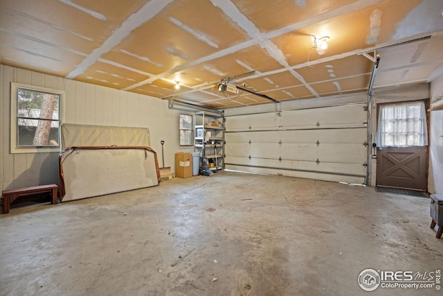 198 Poudre River Rd, Bellvue, CO 80512 - garage featuring a garage door opener