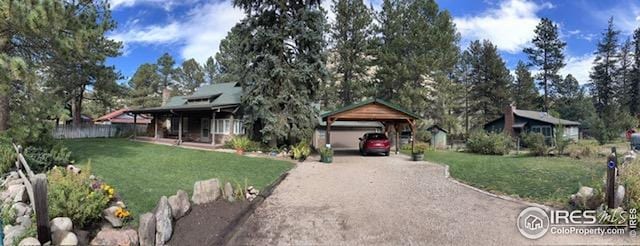 198 Poudre River Rd, Bellvue, CO 80512 - view of front of property featuring a porch, driveway, a front yard, and a garage