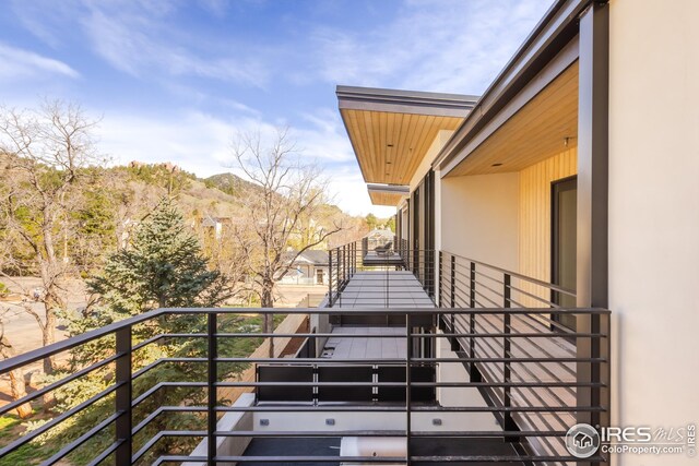 balcony featuring a mountain view