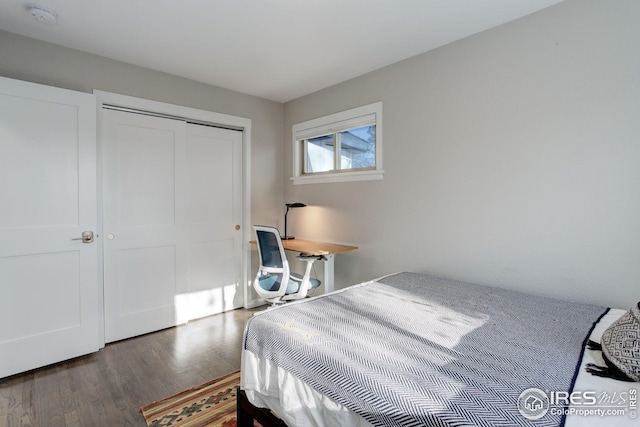 bedroom with a closet and wood finished floors