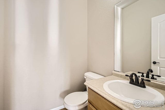 273 Mt Harvard Ave, Severance, CO 80550 - half bathroom with vanity and toilet