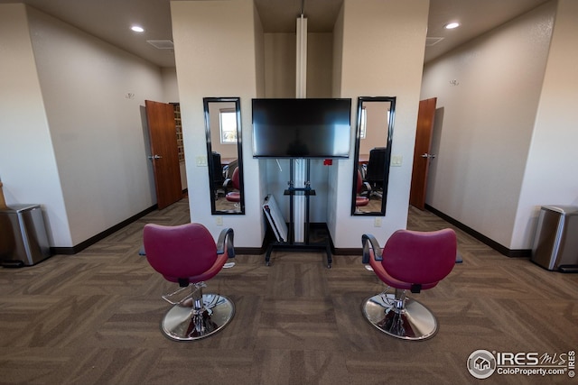 exercise room with baseboards, recessed lighting, and carpet