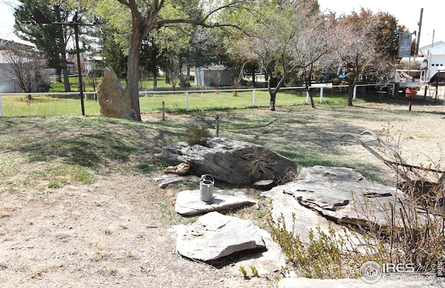 view of yard featuring fence
