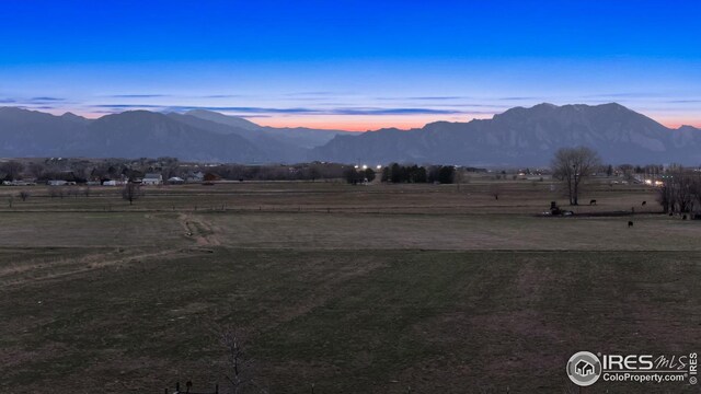 property view of mountains featuring a rural view