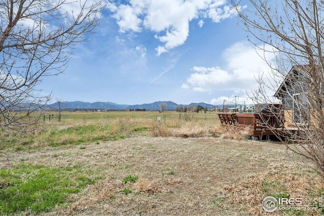 view of mountain feature with a rural view