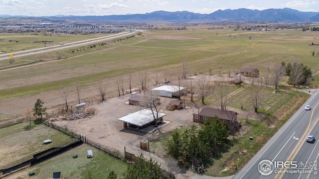 aerial view with a mountain view and a rural view