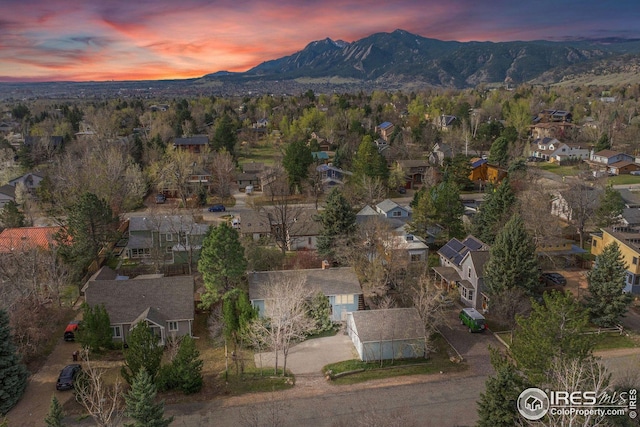 aerial view with a mountain view and a residential view