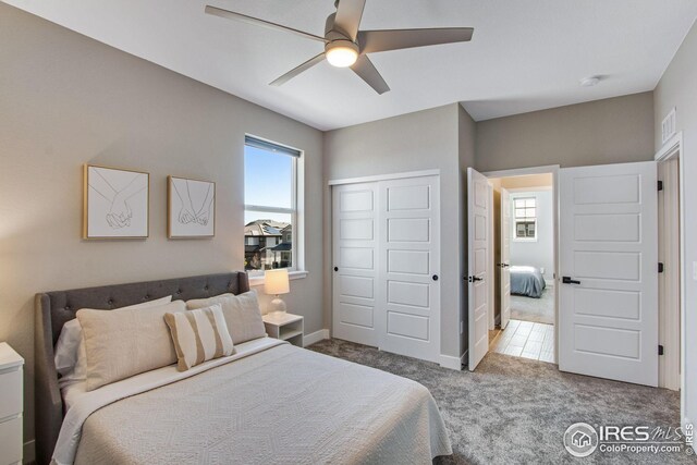 16335 Spanish Peak Way, Broomfield, CO 80023 - bedroom featuring visible vents, carpet flooring, a closet, and multiple windows