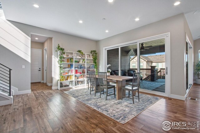 16335 Spanish Peak Way, Broomfield, CO 80023 - dining space with baseboards, wood finished floors, and recessed lighting