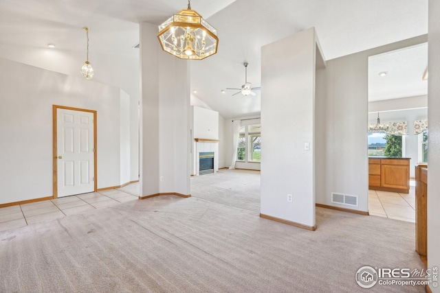 unfurnished living room featuring visible vents, baseboards, and carpet