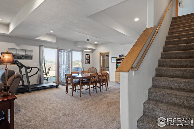 9 Mummy View Ct, Livermore, CO 80536 - dining room with light carpet, stairway, and recessed lighting
