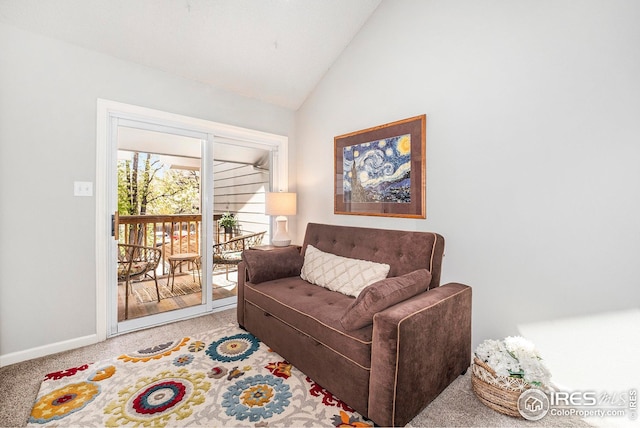 1226 Atwood St, Longmont, CO 80501 - carpeted living area featuring high vaulted ceiling and baseboards