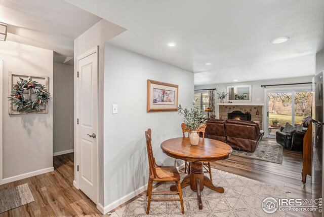 1226 Atwood St, Longmont, CO 80501 - kitchen with light wood finished floors, light countertops, a sink, appliances with stainless steel finishes, and open floor plan