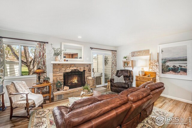 1226 Atwood St, Longmont, CO 80501 - living room featuring light wood-style flooring and baseboards