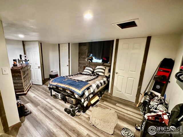 506 E 1st Ave, Otis, CO 80743 - bedroom with wood finished floors
