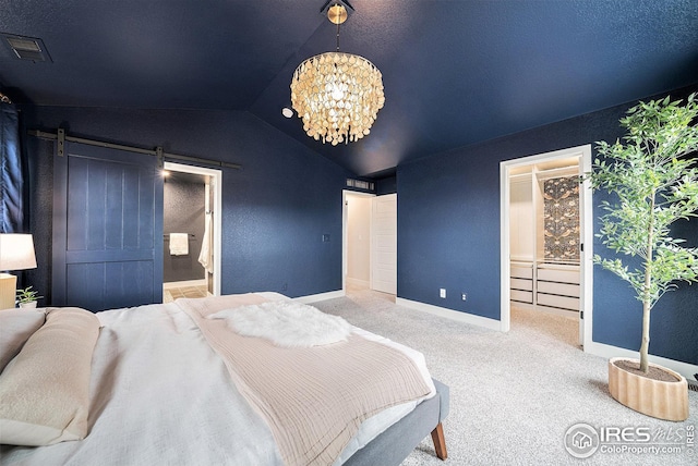 bedroom with a barn door, vaulted ceiling, carpet floors, baseboards, and visible vents