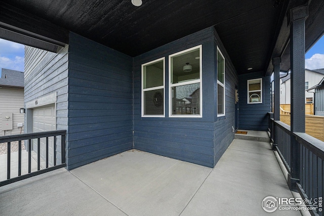 view of patio / terrace featuring an attached garage