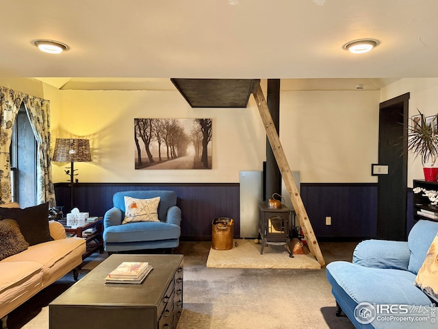 501 Main St, Boulder, CO 80302 - carpeted living room with wainscoting and wall of books