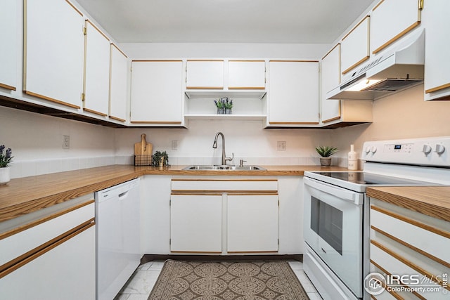 kitchen with under cabinet range hood, light countertops, open shelves, a sink, and white appliances