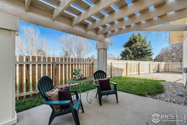 view of patio with a pergola and a fenced backyard