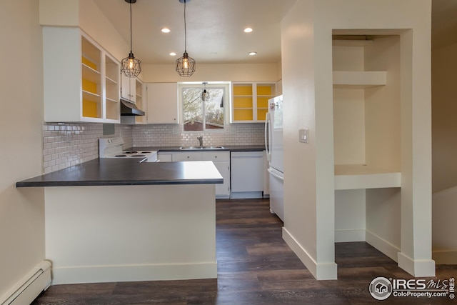 1733 Azalea Dr Unit 2, Fort Collins, CO 80526 - kitchen featuring a peninsula, a sink, dark countertops, baseboard heating, and white appliances