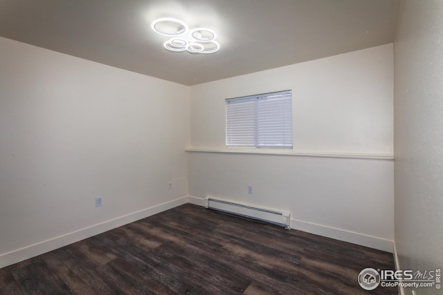 1733 Azalea Dr Unit 2, Fort Collins, CO 80526 - empty room with baseboards, wood finished floors, and a baseboard radiator