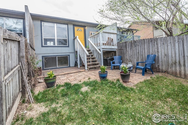 1733 Azalea Dr Unit 2, Fort Collins, CO 80526 - back of house with a patio area, a fenced backyard, stairway, and a deck