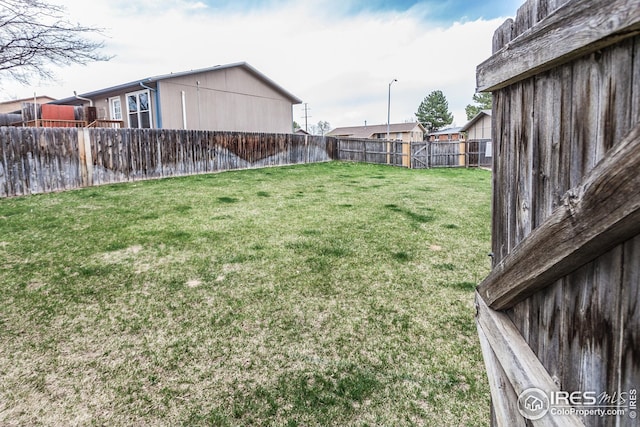 1733 Azalea Dr Unit 2, Fort Collins, CO 80526 - view of yard with a fenced backyard