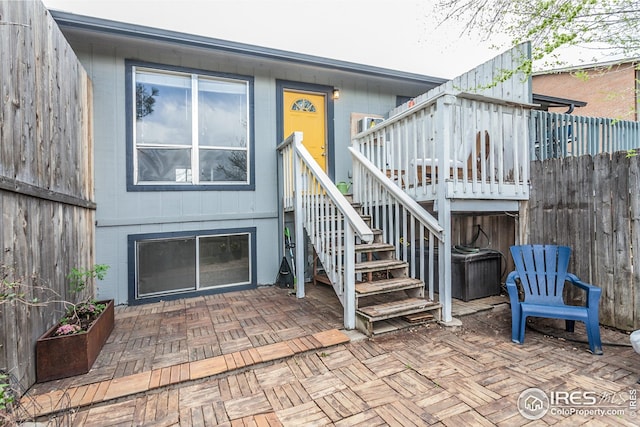 1733 Azalea Dr Unit 2, Fort Collins, CO 80526 - entrance to property with a patio area, fence, and a deck