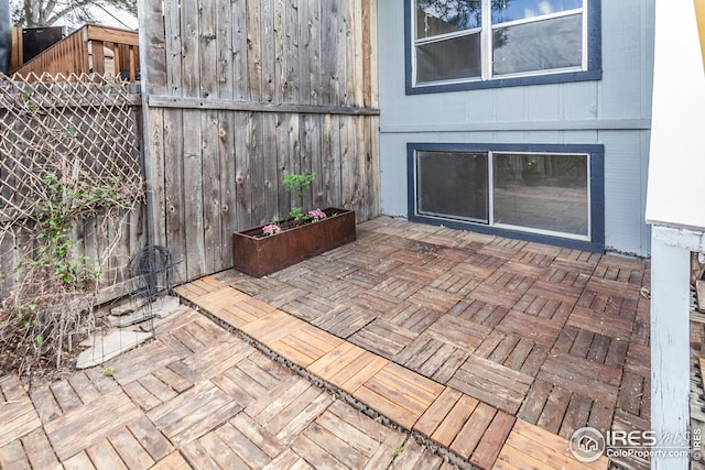 1733 Azalea Dr Unit 2, Fort Collins, CO 80526 - view of patio featuring fence