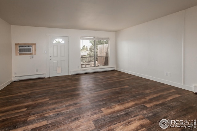 1733 Azalea Dr Unit 2, Fort Collins, CO 80526 - entryway with baseboards, dark wood finished floors, a wall mounted air conditioner, and baseboard heating