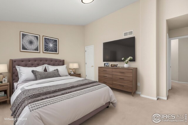 2930 W Stuart St Unit 27, Fort Collins, CO 80526 - bedroom featuring light carpet and baseboards