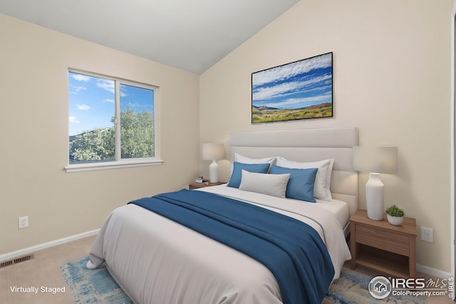 2930 W Stuart St Unit 27, Fort Collins, CO 80526 - carpeted bedroom with baseboards and lofted ceiling