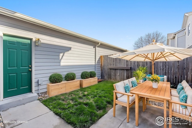 2930 W Stuart St Unit 27, Fort Collins, CO 80526 - view of patio featuring fence and outdoor dining area