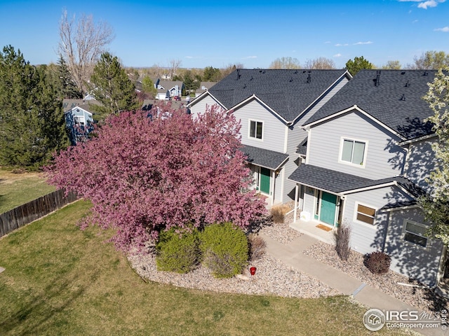 2930 W Stuart St Unit 27, Fort Collins, CO 80526 - back of house featuring roof with shingles