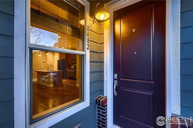 property entrance with a sink