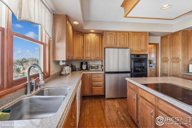 16261 W Ellsworth Ave, Golden, CO 80401 - kitchen with black appliances, a sink, dark wood finished floors, light countertops, and recessed lighting