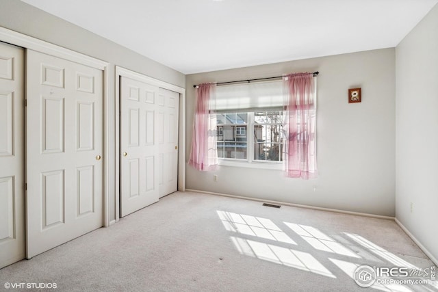 16261 W Ellsworth Ave, Golden, CO 80401 - unfurnished bedroom featuring carpet floors and baseboards