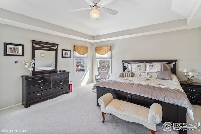 16261 W Ellsworth Ave, Golden, CO 80401 - bedroom featuring a raised ceiling, carpet floors, ceiling fan, and baseboards