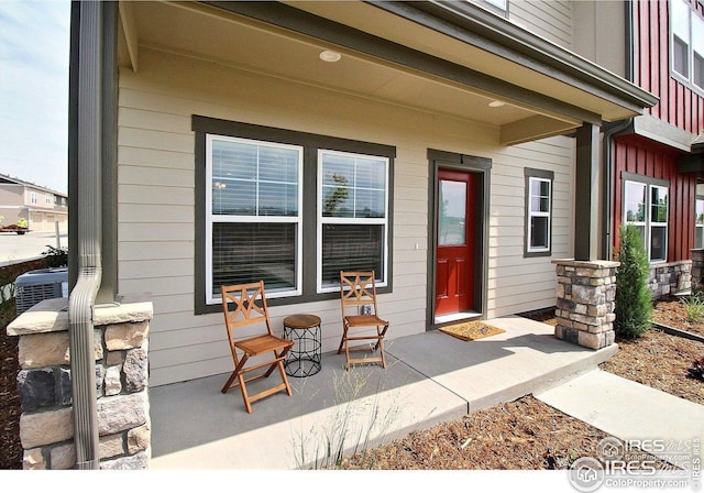 doorway to property featuring covered porch