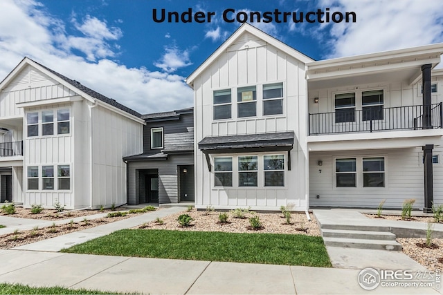 1825 Bounty Dr Unit 5, Windsor, CO 80550 - view of front of home featuring board and batten siding and a balcony