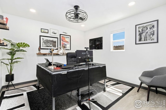 office area featuring baseboards, wood finished floors, and recessed lighting